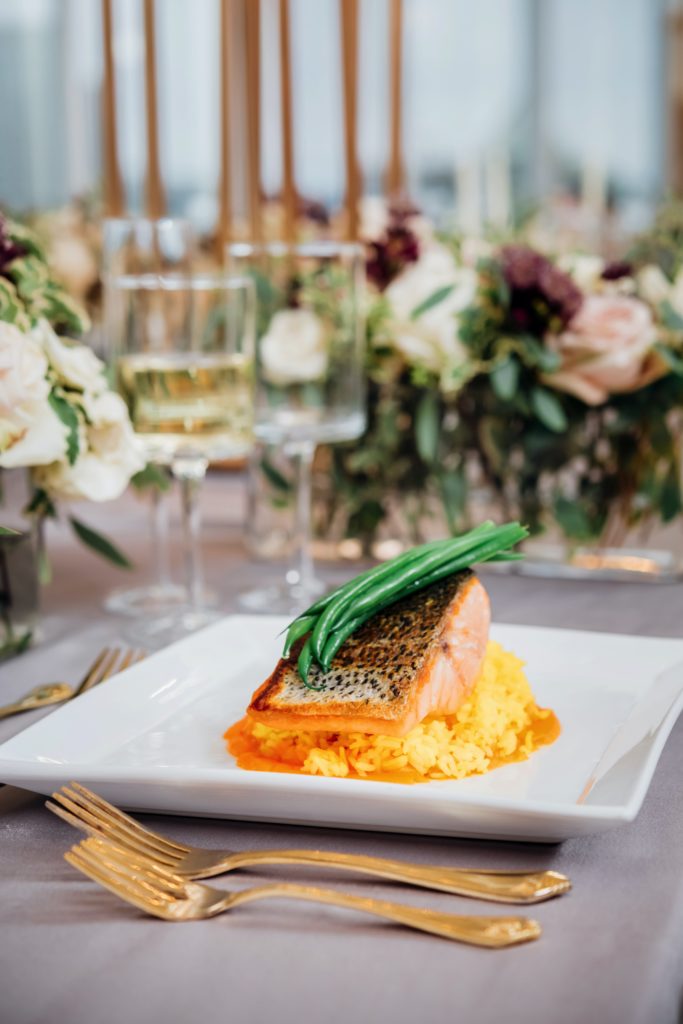 Salmon with vegetables and rice plated on a beautiful decorated table  | Weddings & Events by Cheryl Munro | Toronto Wedding Planner