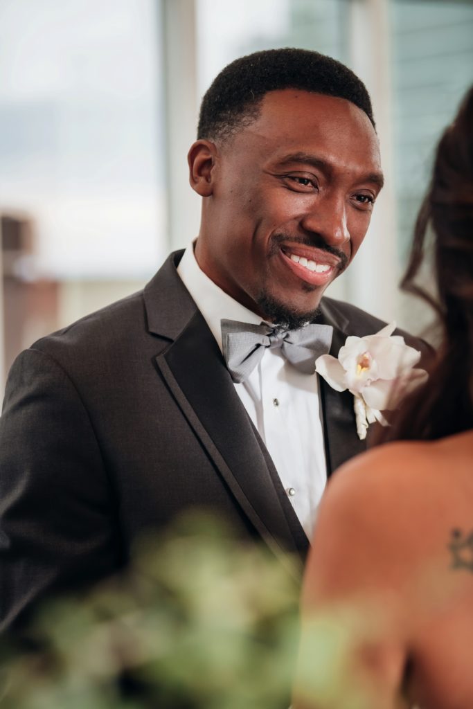 Groom smiling looking at bride  | Weddings & Events by Cheryl Munro | Toronto Wedding Planner