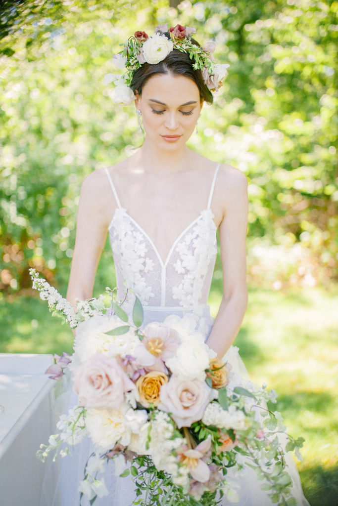 Bride wearing flower crown and holding bouquet  | Weddings & Events by Cheryl Munro | Toronto Wedding Planner