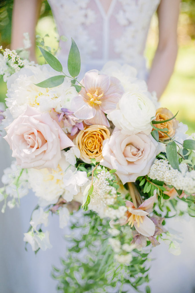 Wedding bouquet of cream, blush and orange flowers  | Weddings & Events by Cheryl Munro | Toronto Wedding Planner