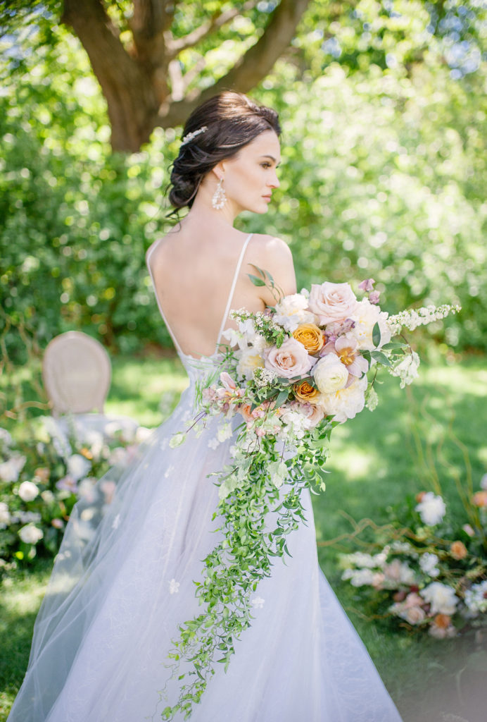Bride holding bouquet  | Weddings & Events by Cheryl Munro | Toronto Wedding Planner
