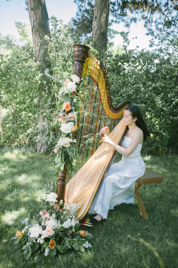 Musician playing the harp  | Weddings & Events by Cheryl Munro | Toronto Wedding Planner