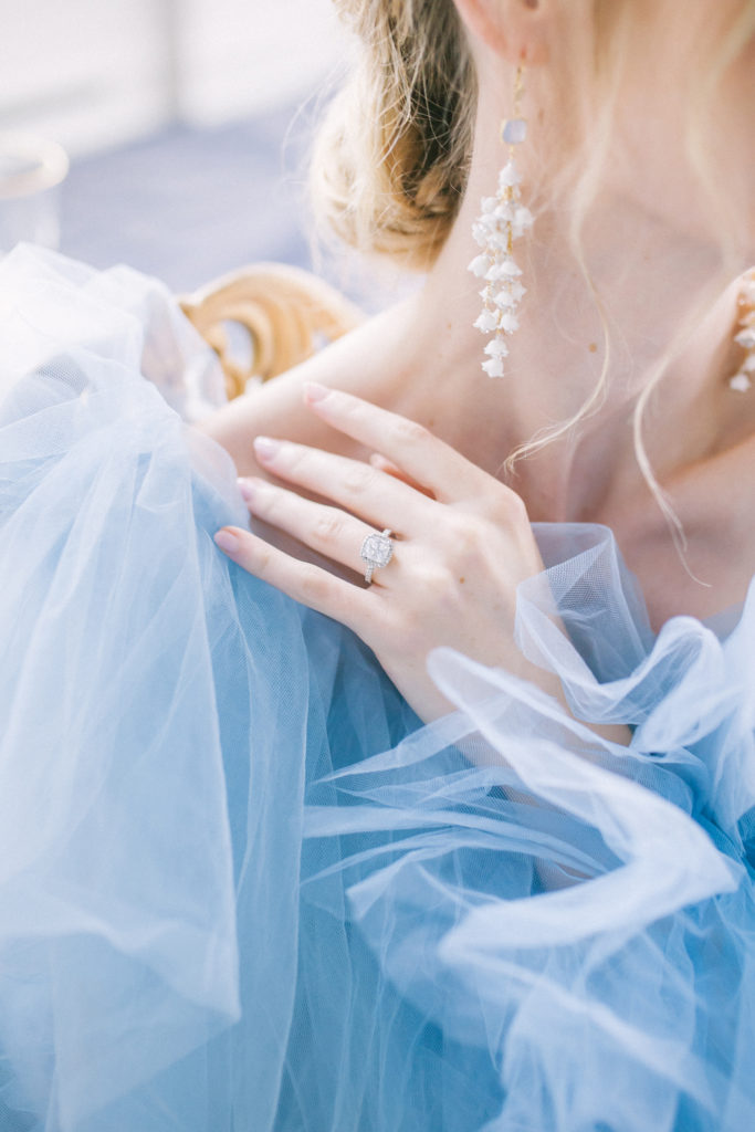 Close up of bride in blue ruffle dress and her engagement ring  | Weddings & Events by Cheryl Munro | Toronto Wedding Planner