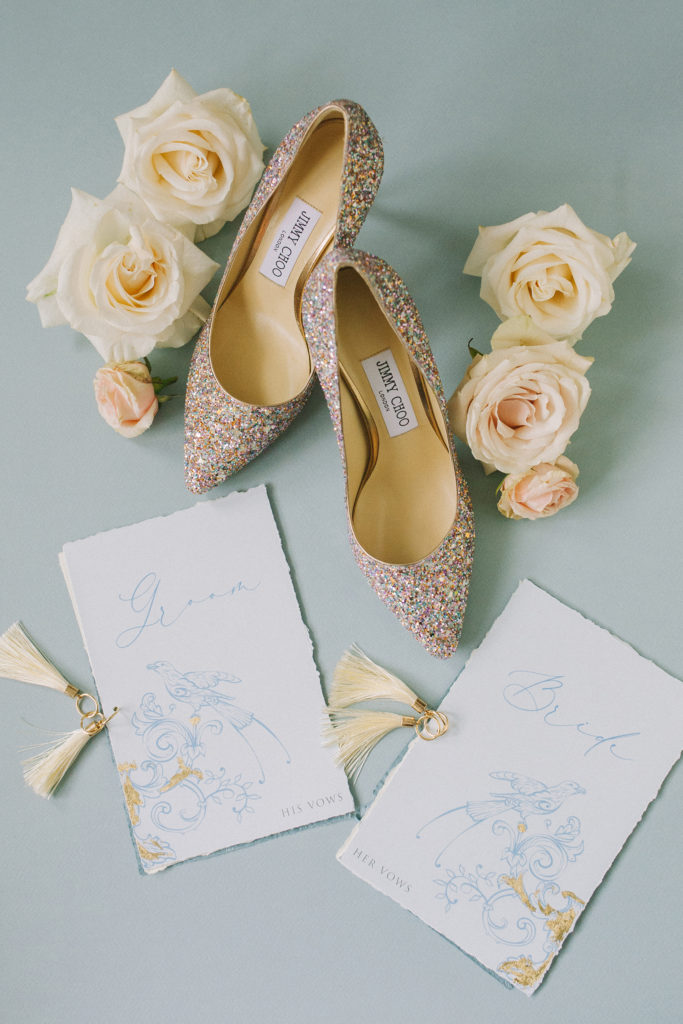 Detail shot with Jimmy Choo shoes, flowers and vow books  | Weddings & Events by Cheryl Munro | Toronto Wedding Planner